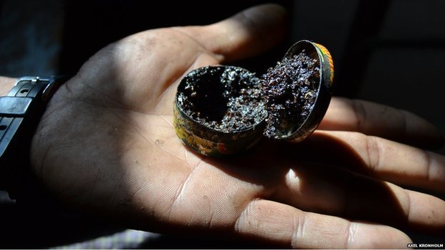 Small tin containing opium