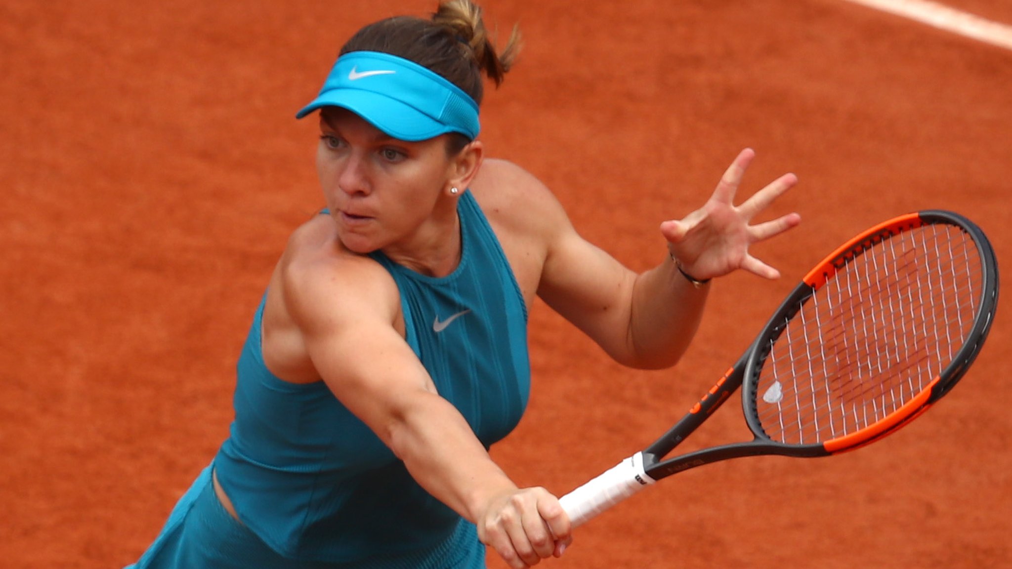 French Open 2018: Simona Halep beats Alison Riske to reach second round