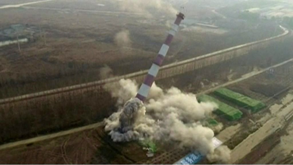 China power tower flattened in demolition