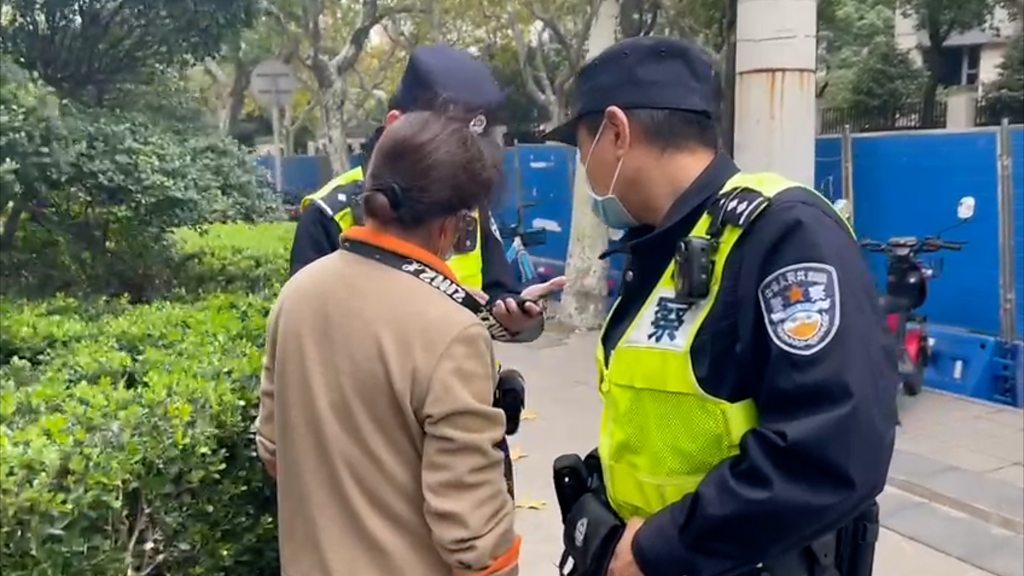 Chinese police: Delete photos or face arrest at protest site