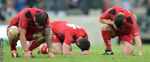 Wales players dejected at the end of the game