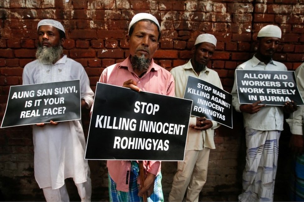Rohingya Muslim refugees hold placards during a protest rally against what the protesters say are killings of Rohingya people in Myanmar, in New Delhi, India, September 5, 2017.