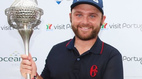 Sullivan wins in Portugal by nine