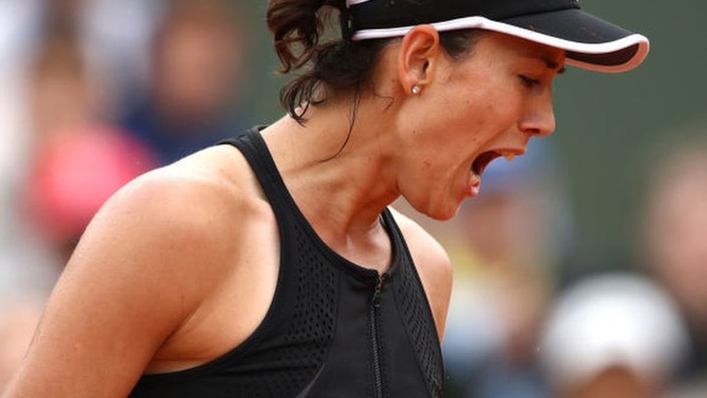 Muguruza overcomes Kuznetsova to reach second round in Paris