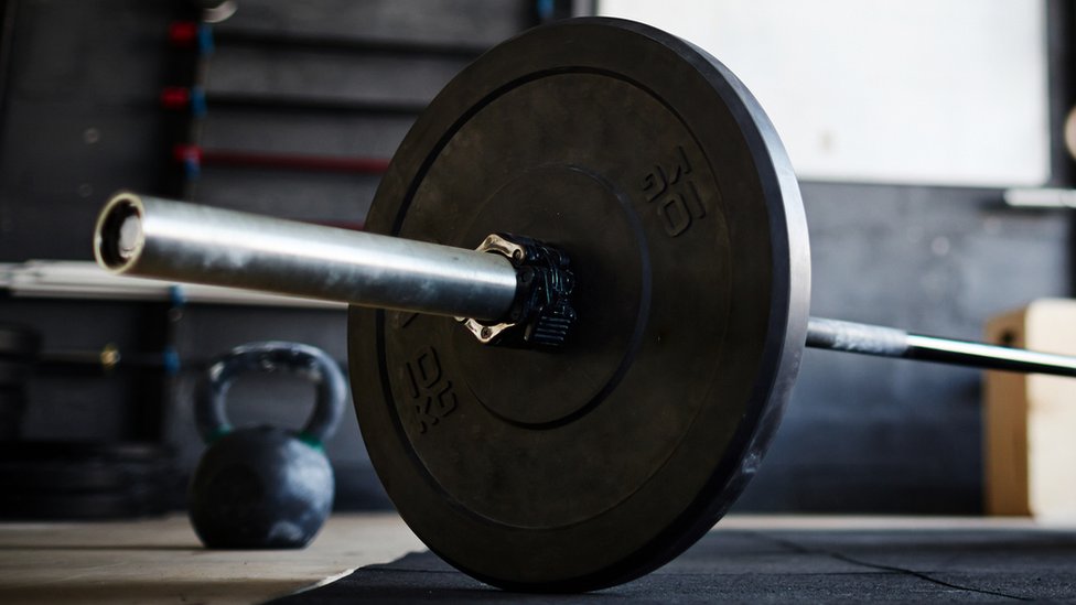 A generic image of a weight attached to a bar