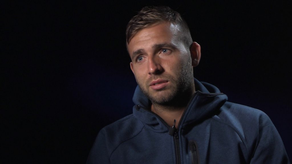 Australian Open: Dan Evans beats Bernard Tomic in front of hostile crowd