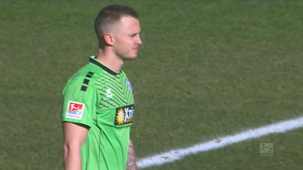 Goalkeeper gifts player goal after turning his back on game to have a drink