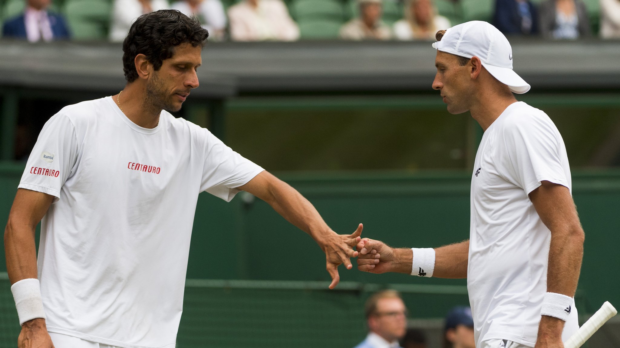 Kubot & Melo win men's doubles, Makarova and Vesnina earn women's title