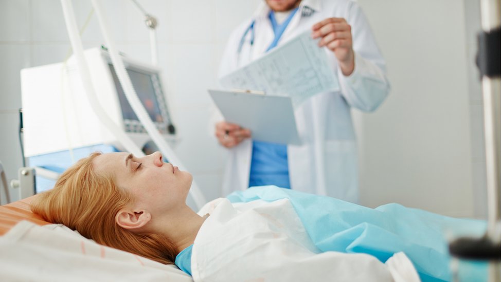 Mujer en coma
