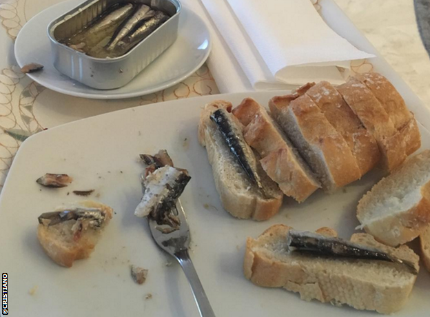 Cristiano Ronaldo eats a plate of sardines