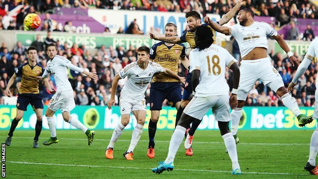 Olivier Giroud scores Arsenal's first goal against Swansea