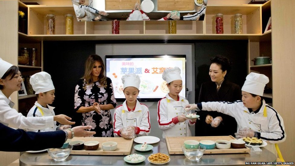 Melania Trump and Chinese First Lady Peng Liyuan watch a cooking demonstration