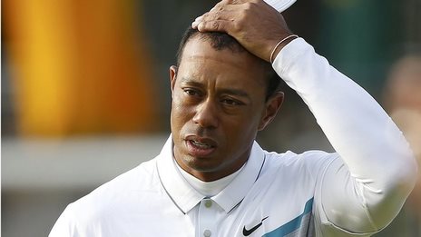 Woods misses cut at weather-hit Open