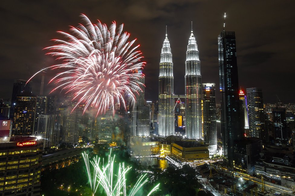 Fireworks illuminate the night sky over Malaysia's Petronas Towers during New Year's Eve celebrations in Kuala Lumpur, Malaysia, 01 January 2018.