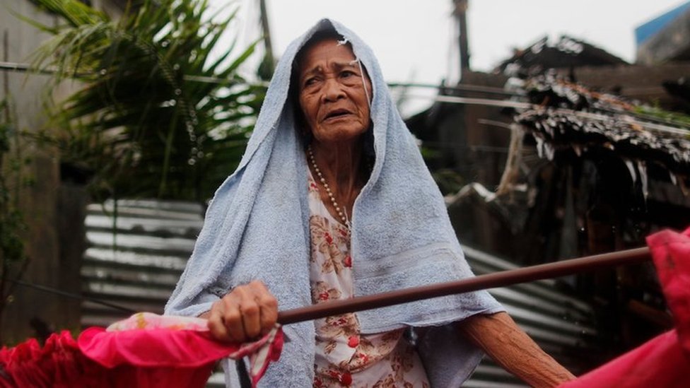 Typhoon Mangkhut: Philippines wakes to storm destruction