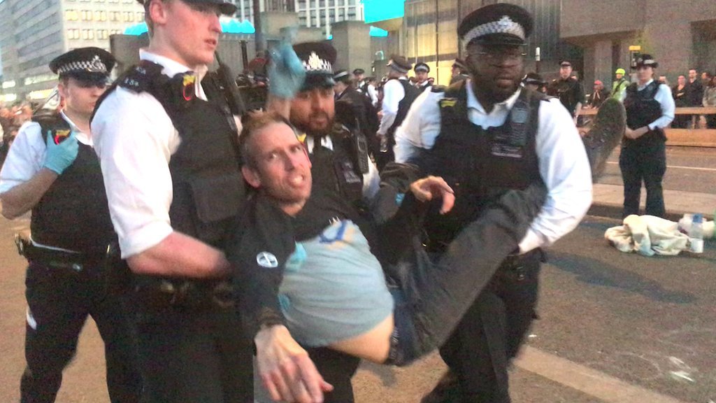 Olympic champion Stott held at climate protests