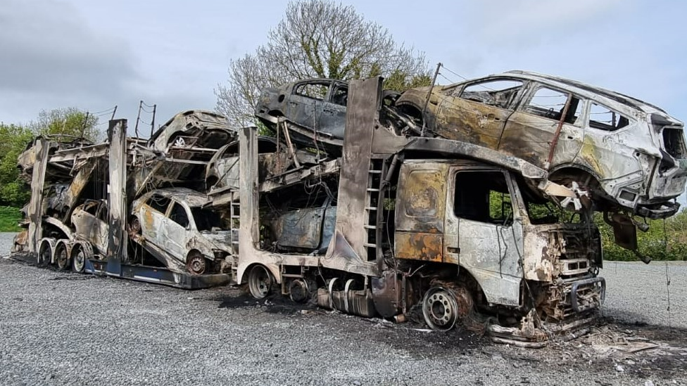 Suspected arson attack destroys 12 vehicles