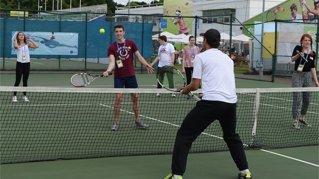 Pros serve up tennis lesson for students