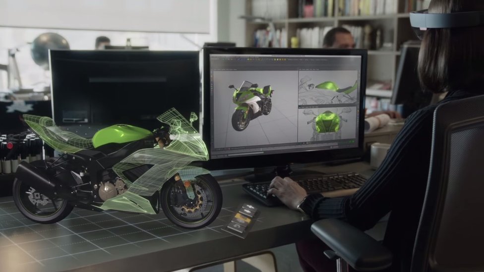 Screengrab from Microsoft HoloLens video showing hologram motorbike on desk