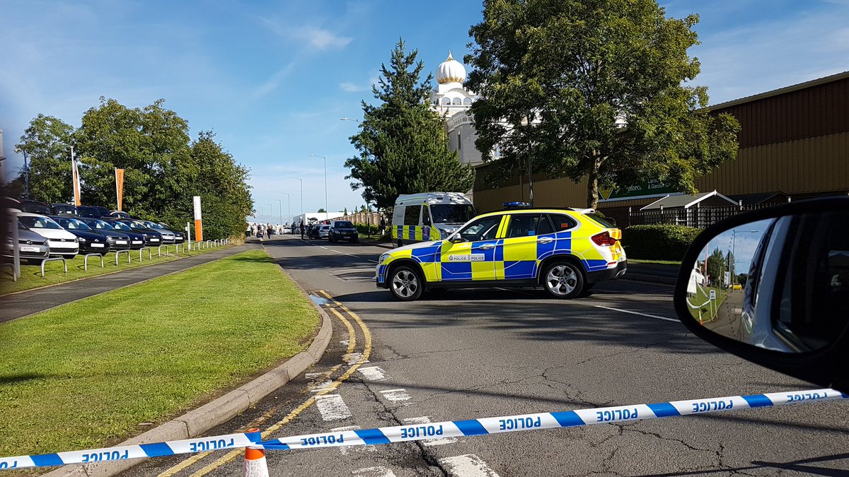 'Armed' men occupy temple in Leamington Spa, say police
