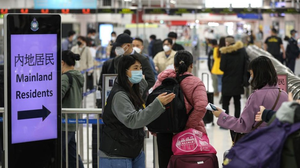 Joy and long queues as China reopens borders