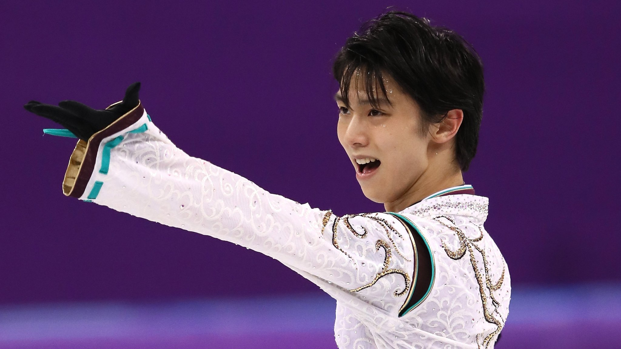 Winter Olympics: Japan's Yuzuru Hanyu wins historic figure skating