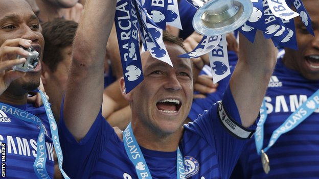 Chelsea skipper John Terry lifts the Premier League trophy
