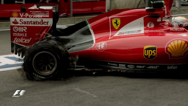 The exploded right-rear tyre on Sebastian Vettel's Ferrari