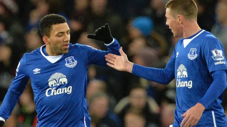 Aaron Lennon celebrates
