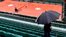 Rain delays Djokovic and Williams