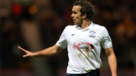 Ex-England striker Davies retires