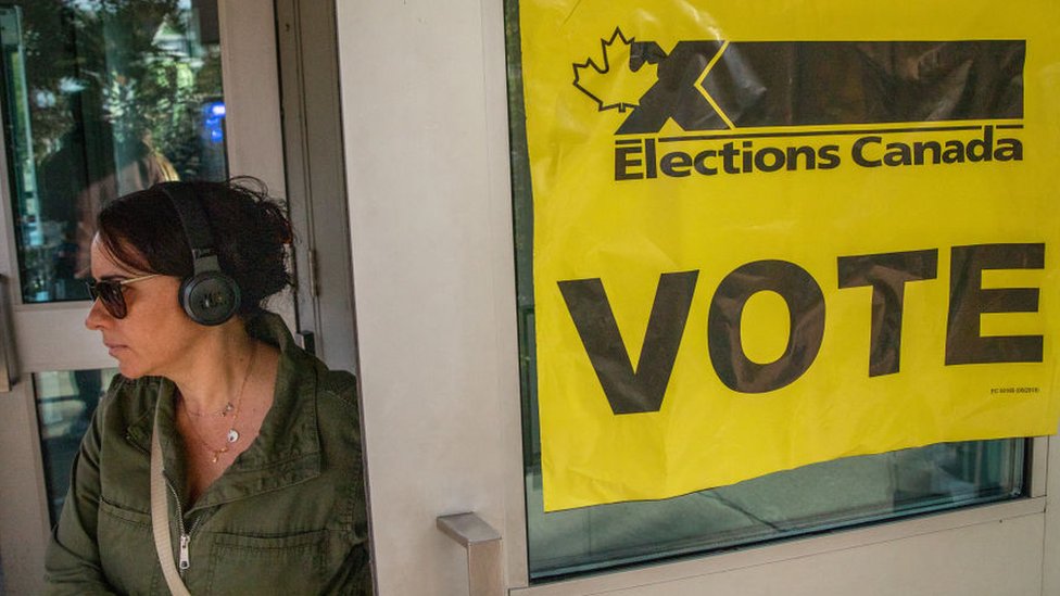 People line up to vote at a polling station at Trinity Community Rec Center for the 2019 election