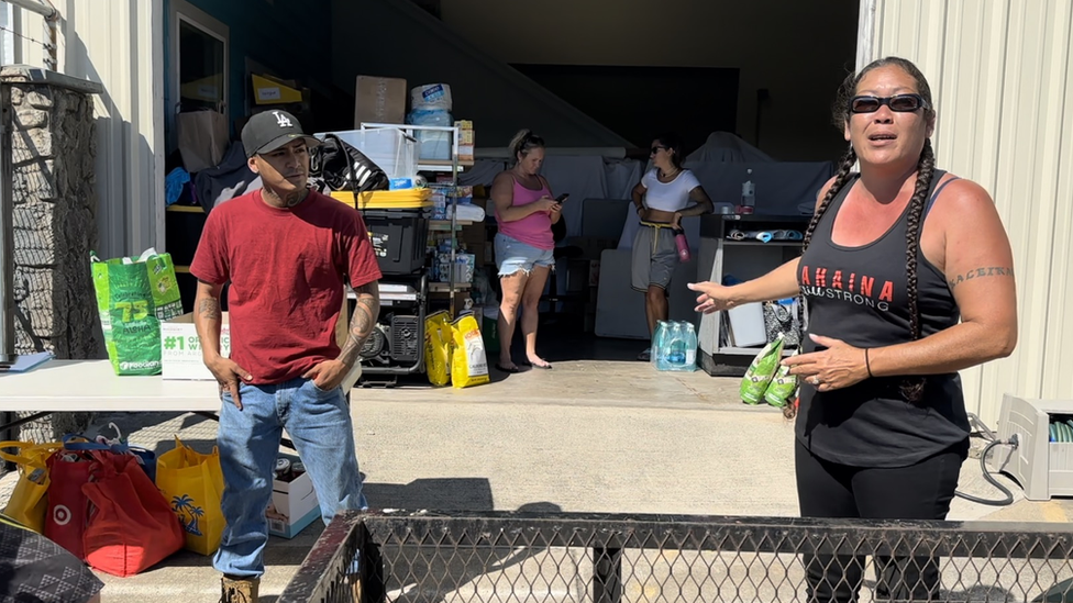 Felicia Johnson (right) is among the locals who have been coordinating efforts to help victims of the wildfires