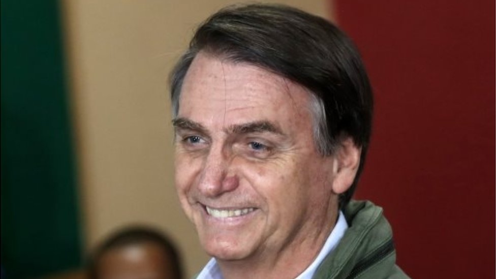 Jair Bolsonaro arrives at a polling station