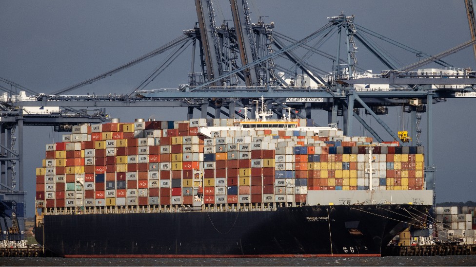 A container ship docked at Felixstowe port last month, stacked high with containers