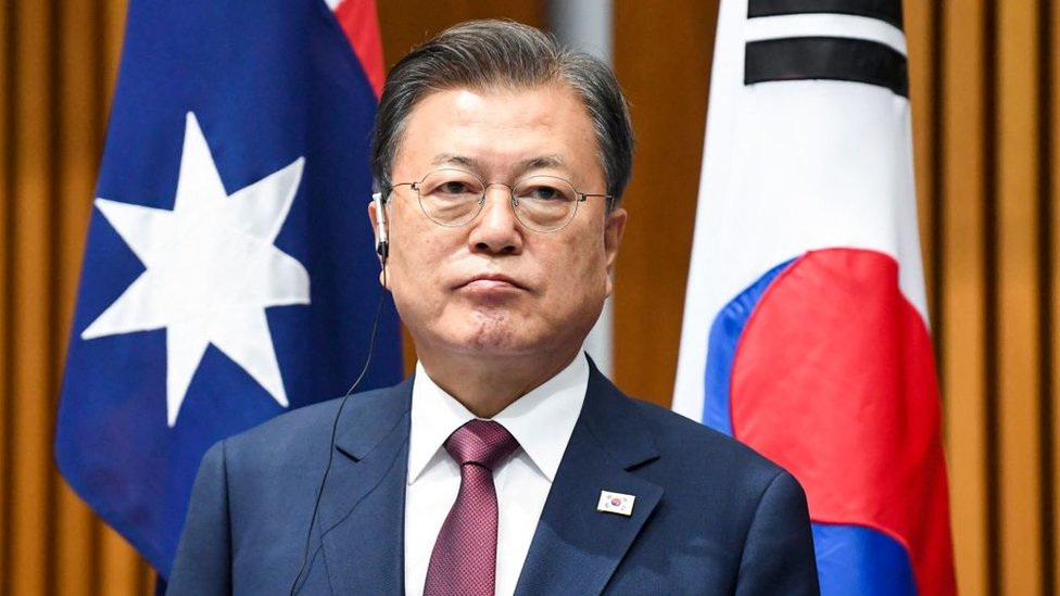 South Korean President Moon Jae-in and Australian Prime Minister Scott Morrison (not pictured) witness a signing ceremony at Parliament House in Canberra on December 13, 2021.