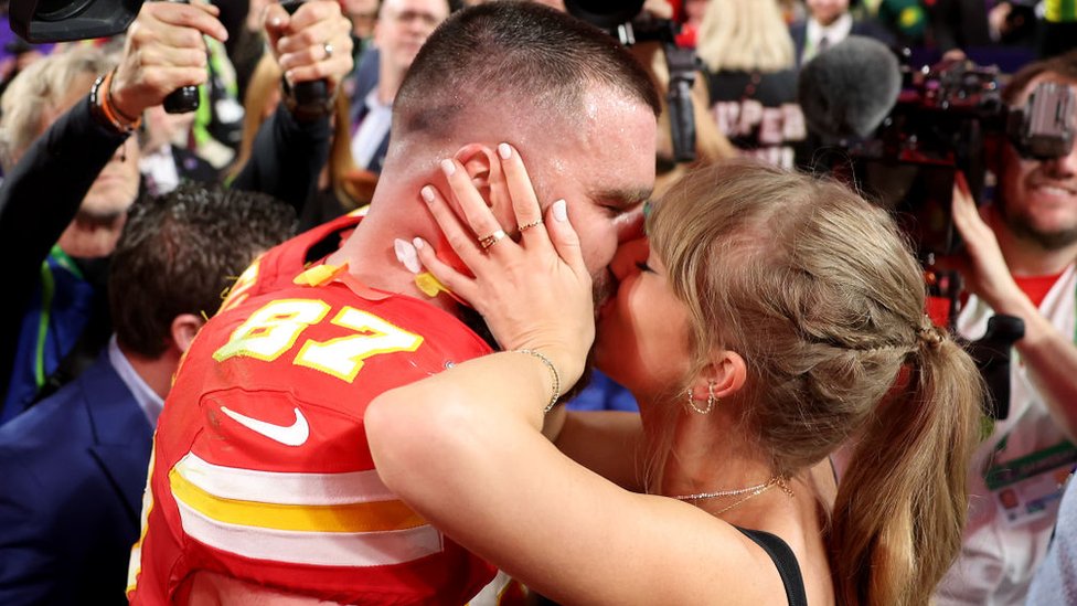 Travis Kelce and Taylor Swift celebrate the Chiefs' Super Bowl win