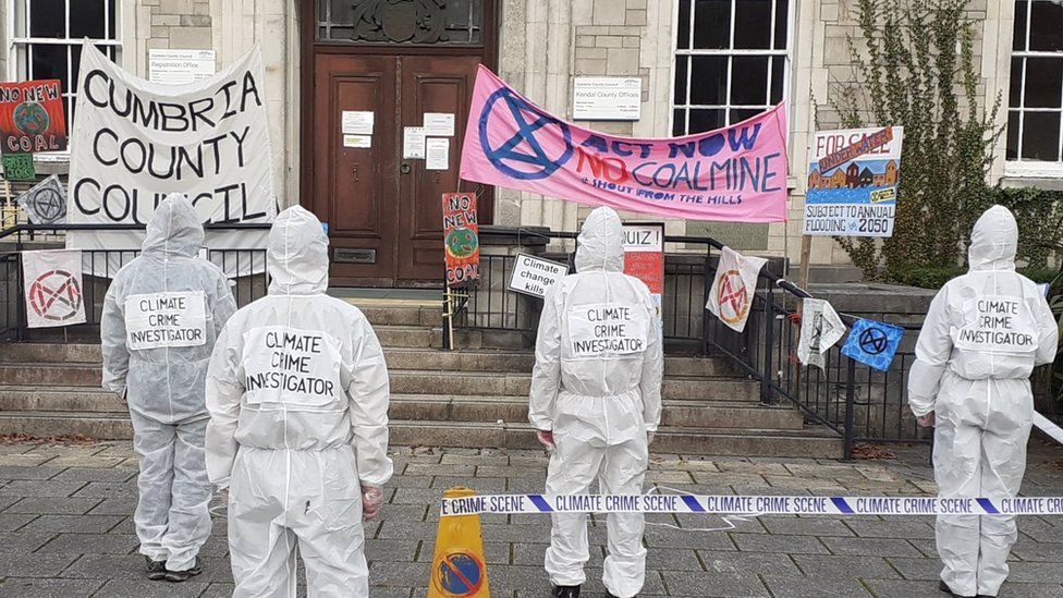 Protestors outside council meeting