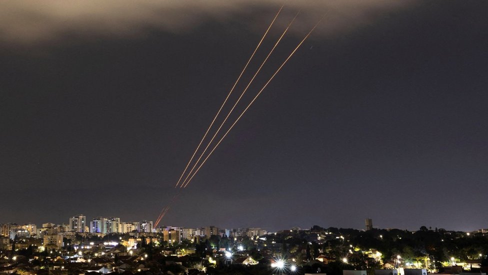 An anti-missile system operates after Iran launched drones and missiles towards Israel, as seen from Ashkelon, Israel 14 April 2024