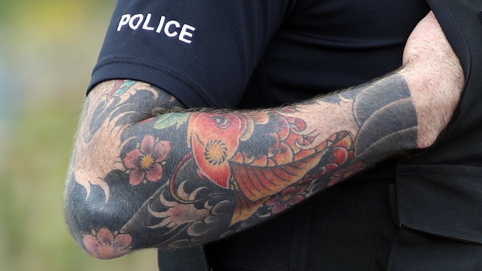 West Yorkshire Police reverse bizarre and unfair policy banning arm  tattoos on officers  The Independent  The Independent