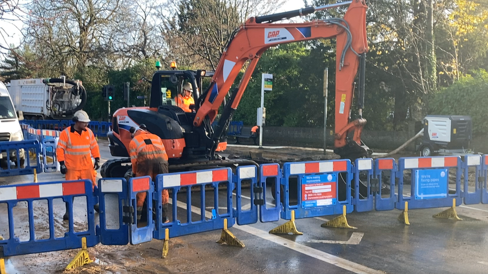 Reading burst water main sees roads closed by flooding