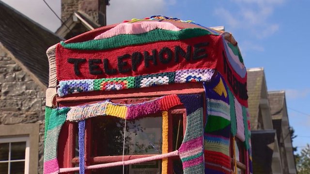 Phone box covered in knitting