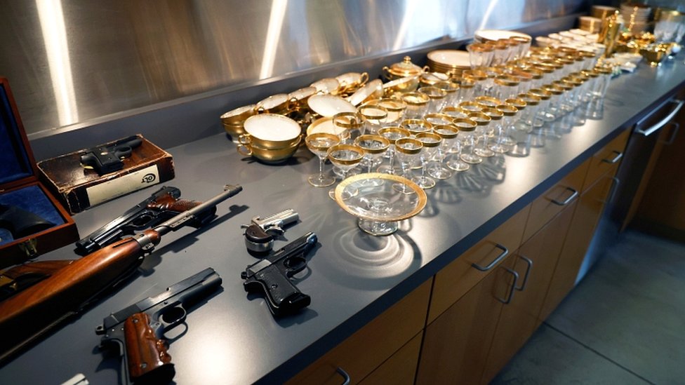 Guns and glassware that belonged to American gangster Al Capone and his son Sonny are displayed ahead of an auction in Sacramento, California, on 5, October 2021.