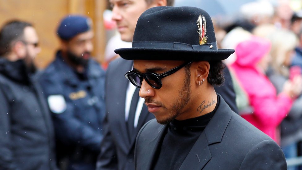 Lewis Hamilton arrives at the funeral