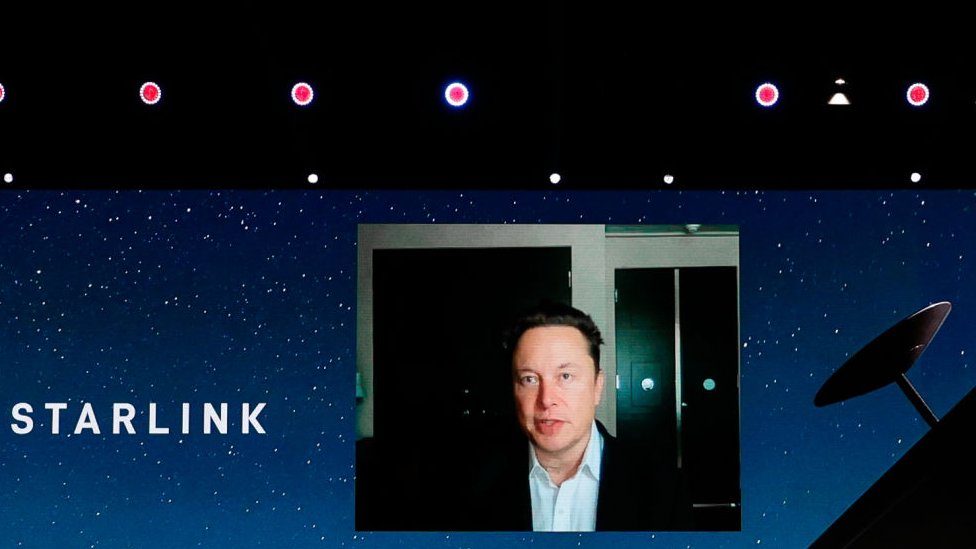 Elon Musk delivering a presentation on starlink last year
