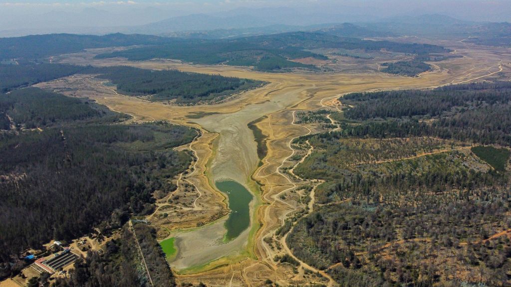 Aerial view of Peñuelas Lake, a reservoir in Chile's Valparaiso Region, taken on March 18, 2022 - The reservoir, which supplies drinking water to Valparaiso and Viña del Mar, accumulates 0.2% of its total water capacity as the central zone of Chile faces one of the most extensive droughts since records exist. With a total capacity of 95 million cubic metres, the lake currently accumulates only 170 thousand cubic metres.