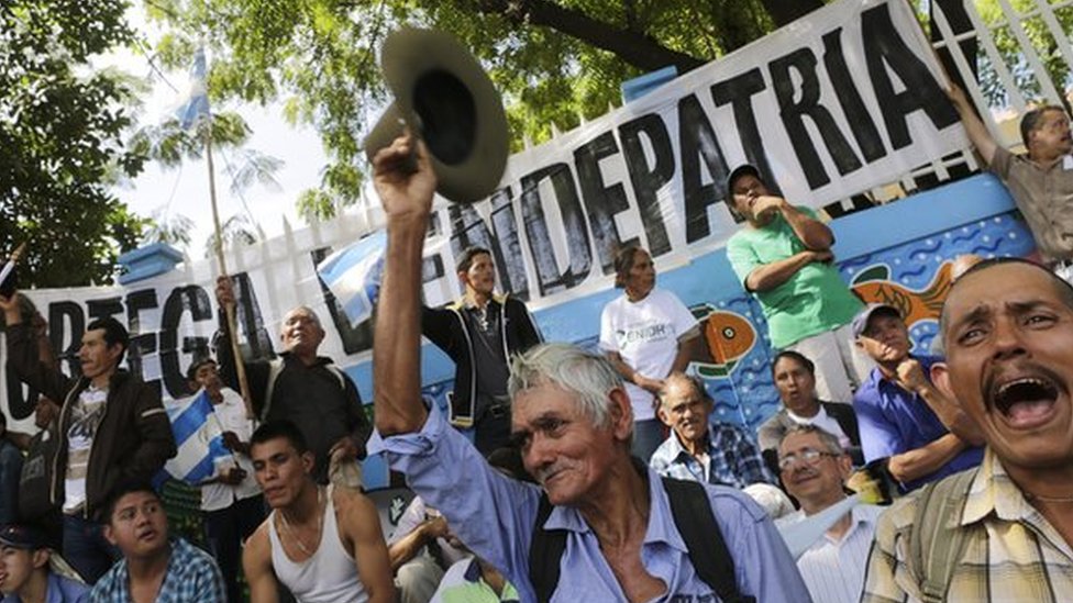 Demonstrators take part in a march against the construction of an inter-oceanic canal in Managua on 10 December, 2014
