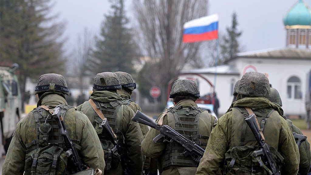 Russian soldiers patrol the area outside Simferopol, Crimea, 2014