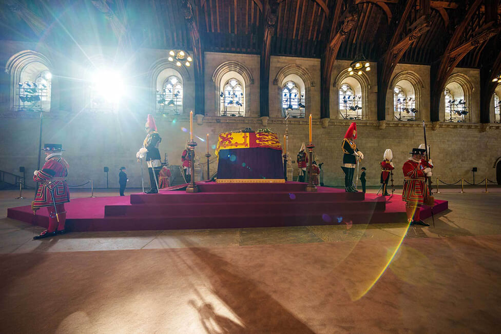 Soldiers from units that serve the Royal Household guarding each corner of the platform