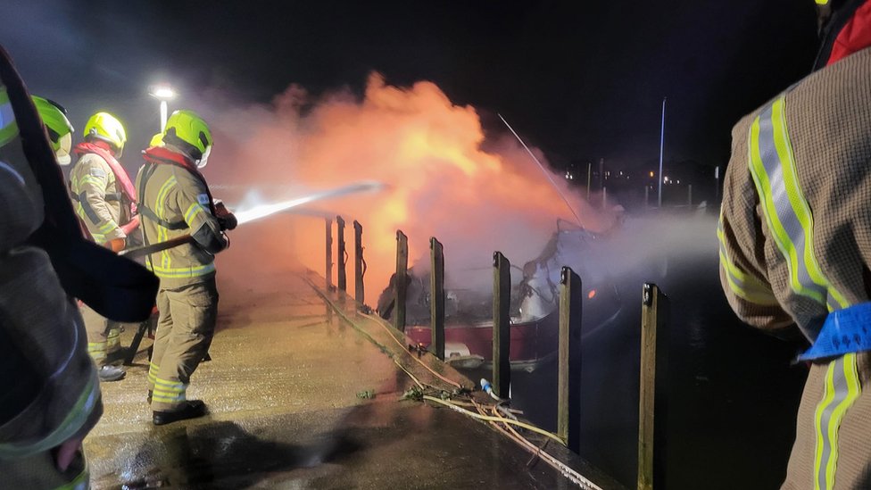 Crews tackle fire involving three boats in Oulton Broad